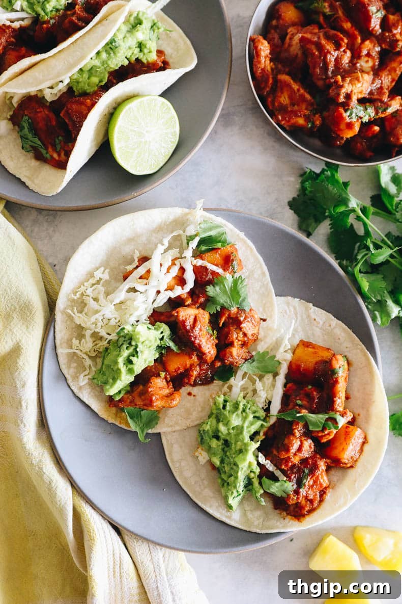 Achiote-Spiced Chicken Pastor 8 overhead of al pastor chicken tacos.