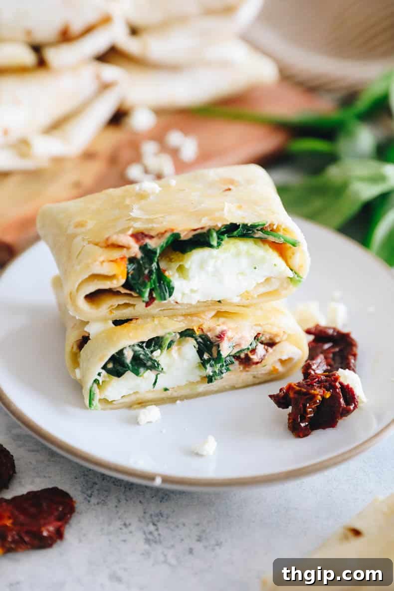 The Perfect Homemade Spinach Feta Breakfast Wrap 12 A beautifully presented Starbucks spinach feta wrap, ready to be devoured, highlighting its golden exterior.