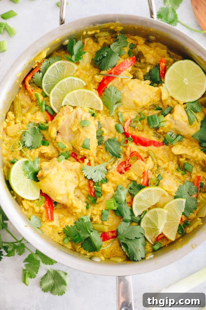 Single-Pot Tandoori Feast 6 The finished one-pot tandoori chicken and rice, steaming hot and garnished with fresh cilantro and lime.
