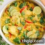 One-Pot Tandoori Chicken and Rice with red bell peppers, green beans, green onions and lime slices