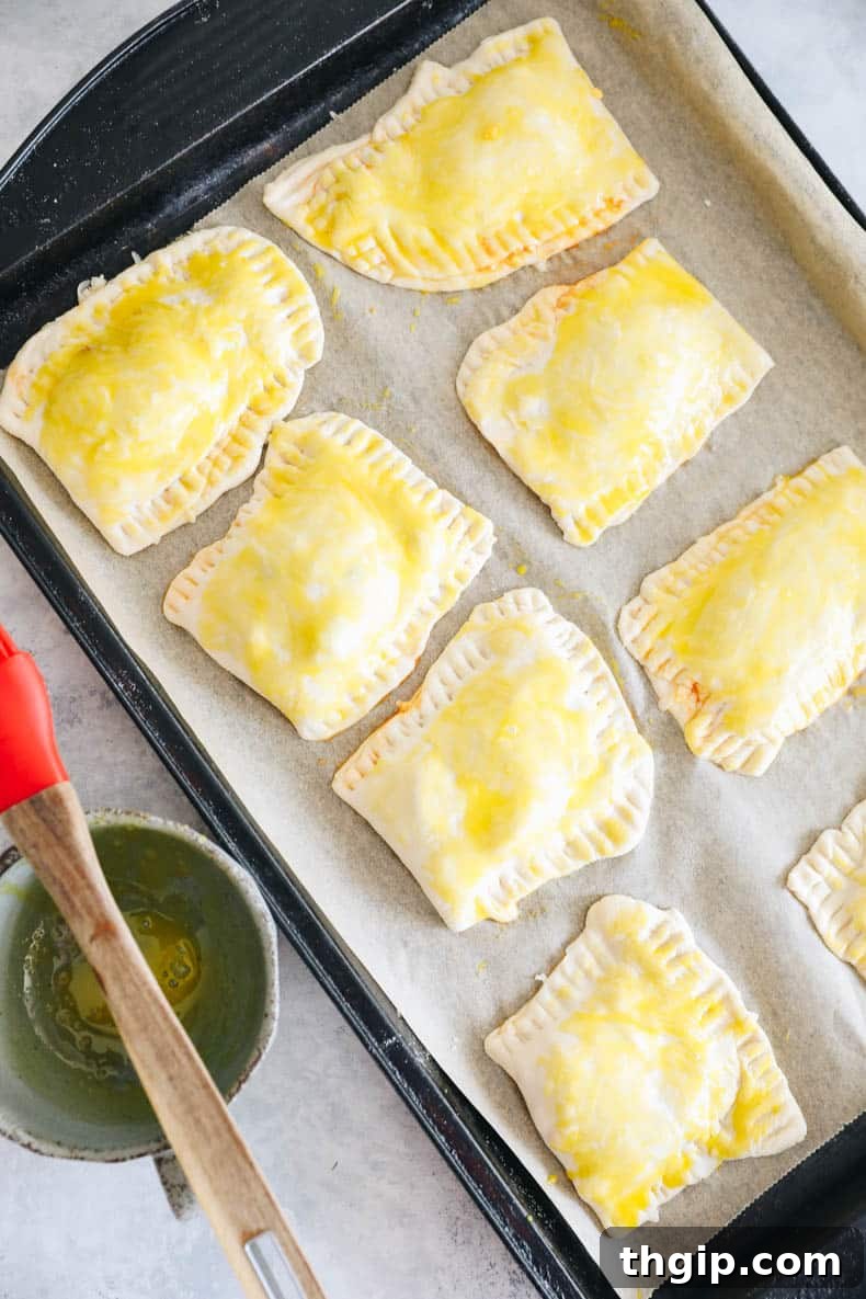 folding and sealing pizza pocket with a fork