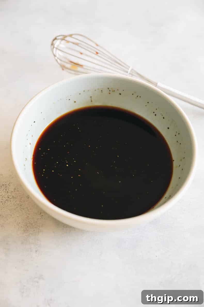 kung pao chicken sauce in a blue bowl.