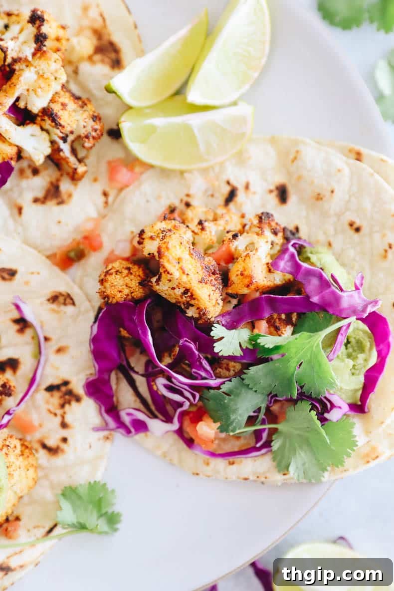 Loaded Crispy Cauliflower Tacos 5 close up of cauliflower tacos in a tortilla