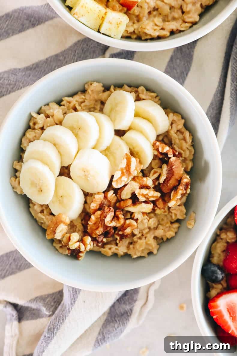 Mastering Your Morning Oats 10 A comforting bowl of oatmeal garnished with slices of fresh banana and a sprinkle of chopped walnuts, offering a classic and wholesome combination.