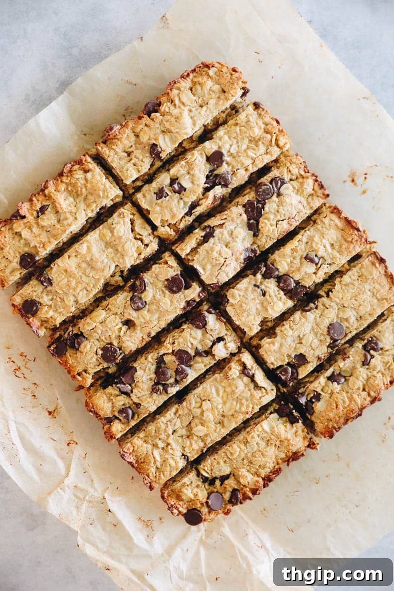 Power-Packed Protein Granola Bars 3 Close-up of baked and perfectly sliced homemade high protein granola bars, showing texture and ingredients.