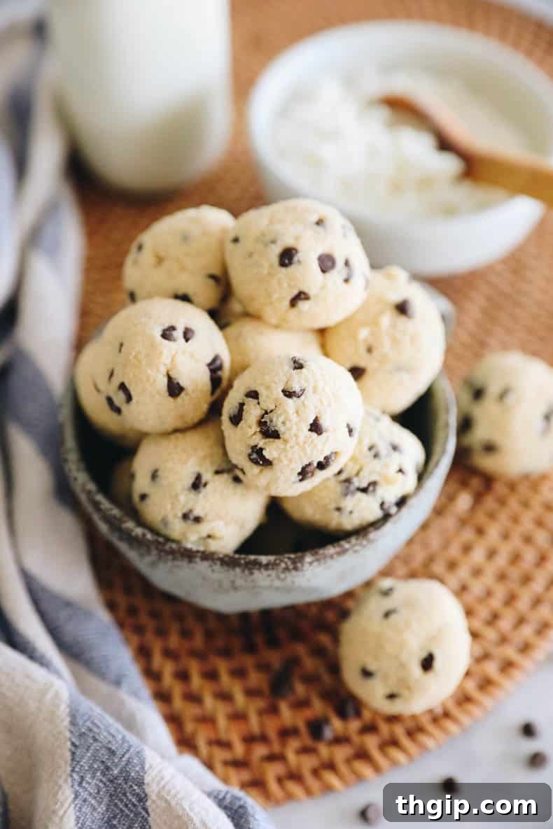 Cottage cheese protein balls with chocolate chips served in a blue cup.