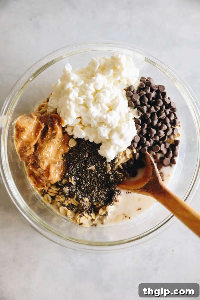 Creamy Cookie Dough Protein Overnight Oats 3 All the dry and wet ingredients laid out for cottage cheese overnight oats recipe preparation.