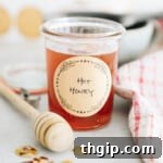 hot honey in a small mason jar with a brown label that says "hot honey".