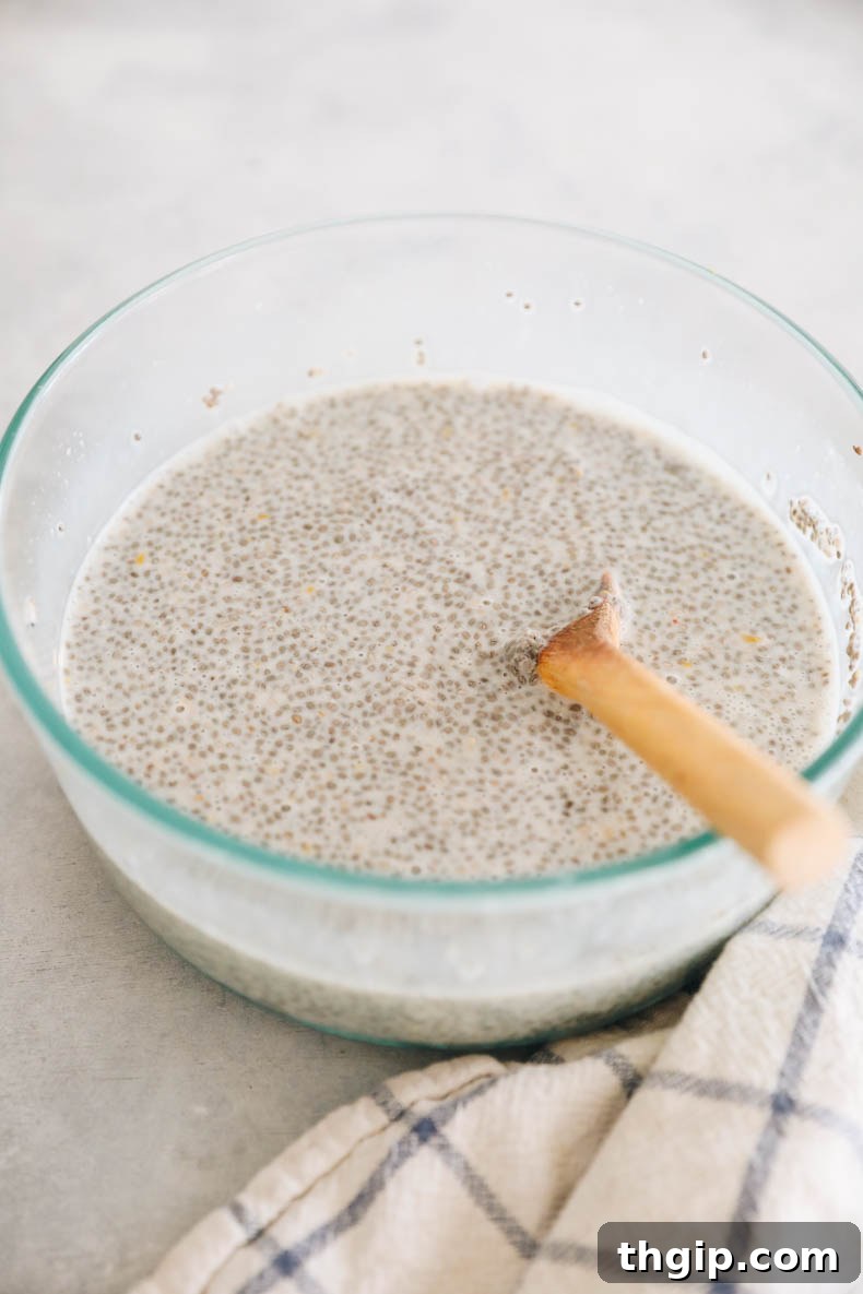 Sunshine Citrus Chia Pudding 3 All ingredients for chia pudding mixed together in a large glass bowl before chilling.