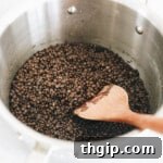 black beluga lentils cooked in a pot.