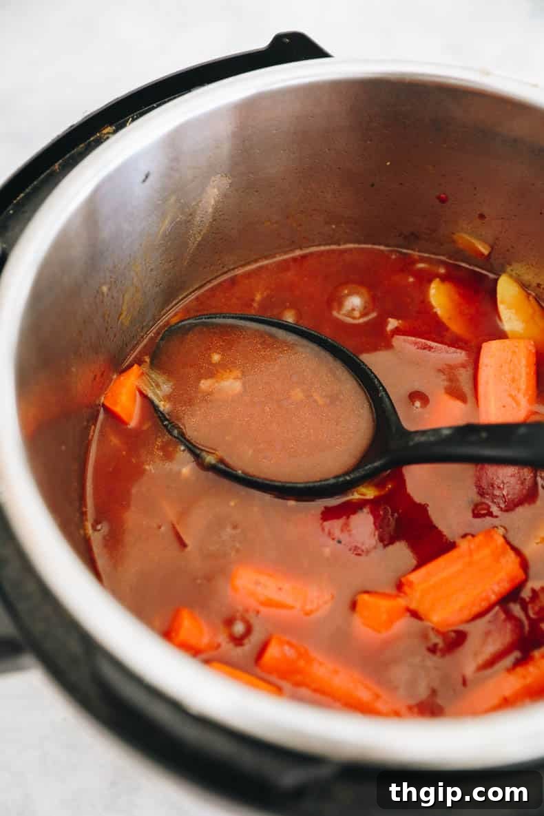 Thickened, rich gravy shimmering in an Instant Pot, ready to complement the pot roast.