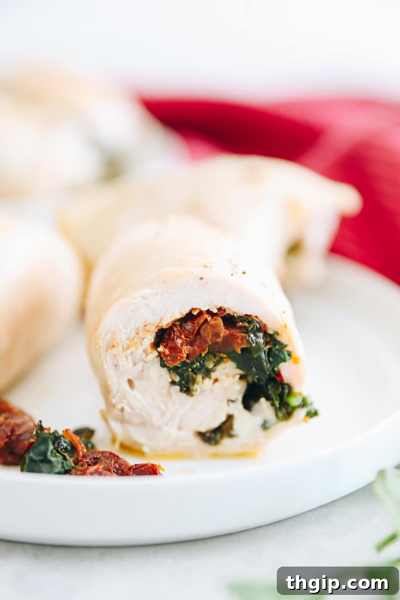 Two halves of chicken breast, butterflied and pounded thin, ready to be filled.