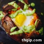 Sweet Potato Egg Boats with Avocado Crema and Bacon