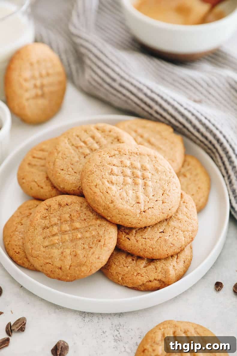 Wholesome Peanut Butter Treats 7 Healthy peanut butter cookies in a decorative bowl, inviting to be eaten.
