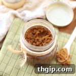 Homemade Gingerbread Body Scrub in a mason jar.