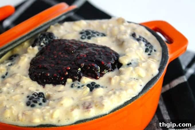 Another angle of the delicious Overnight Blackberry Coconut Oats, showcasing fresh berries and coconut flakes.