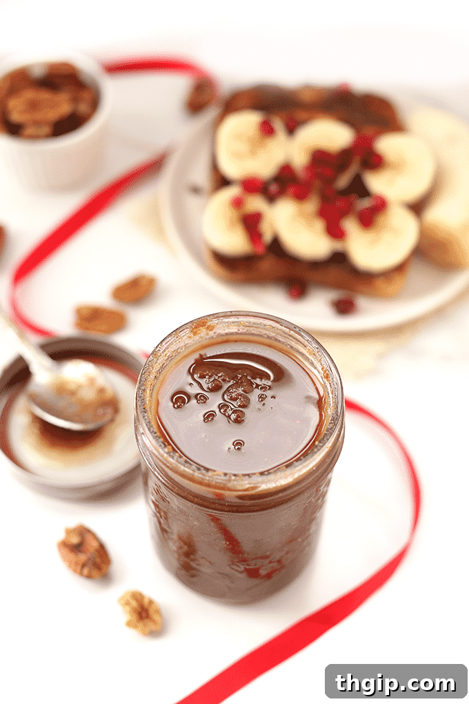 Golden Maple Pecan Spread 2 Delicious homemade Maple Pecan Butter in a jar, perfect for spreading on toast or adding to recipes.