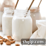 Small glass jar of homemade almond milk.