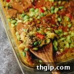 Finished Thai Peanut Quinoa Bake with sauce.